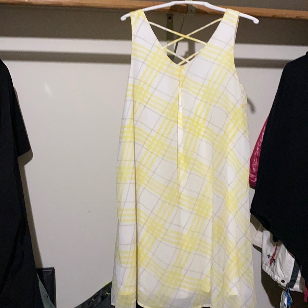 Fun and flirty yellow and white patterned dress
